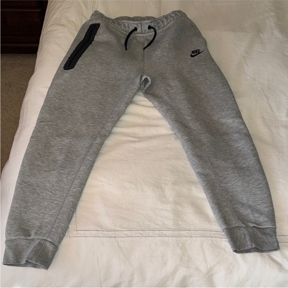Used (once) Nike Tech (Boys large) Grey pants